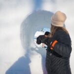 Nallikari Snowfest is an international snow sculpting competition. In the photo, the 2025 winner from the Czech team is working hard.