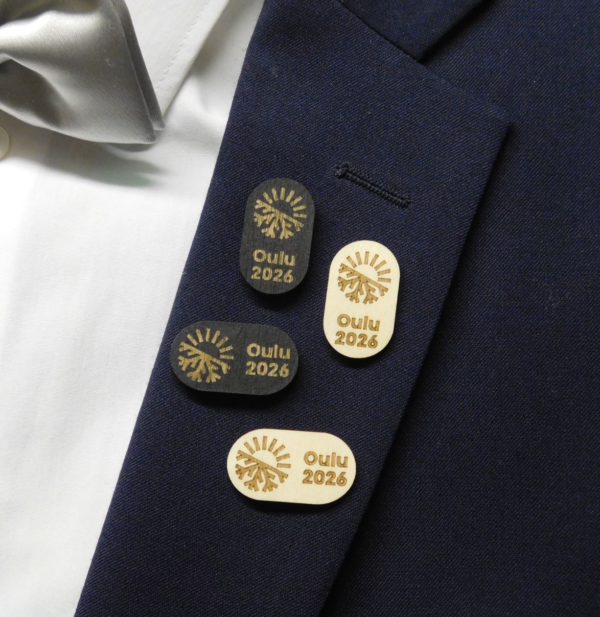 AspenLaser Oulu2026 lapel pin (photo Aaron Byman)